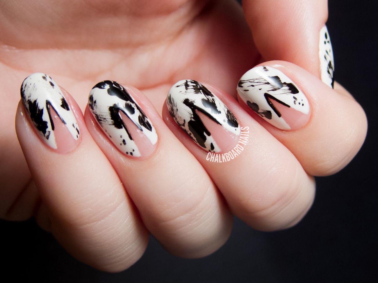  http://www.chalkboardnails.com/2014/09/inky-negative-space-nail-art-inspired-by-donna-karan.html