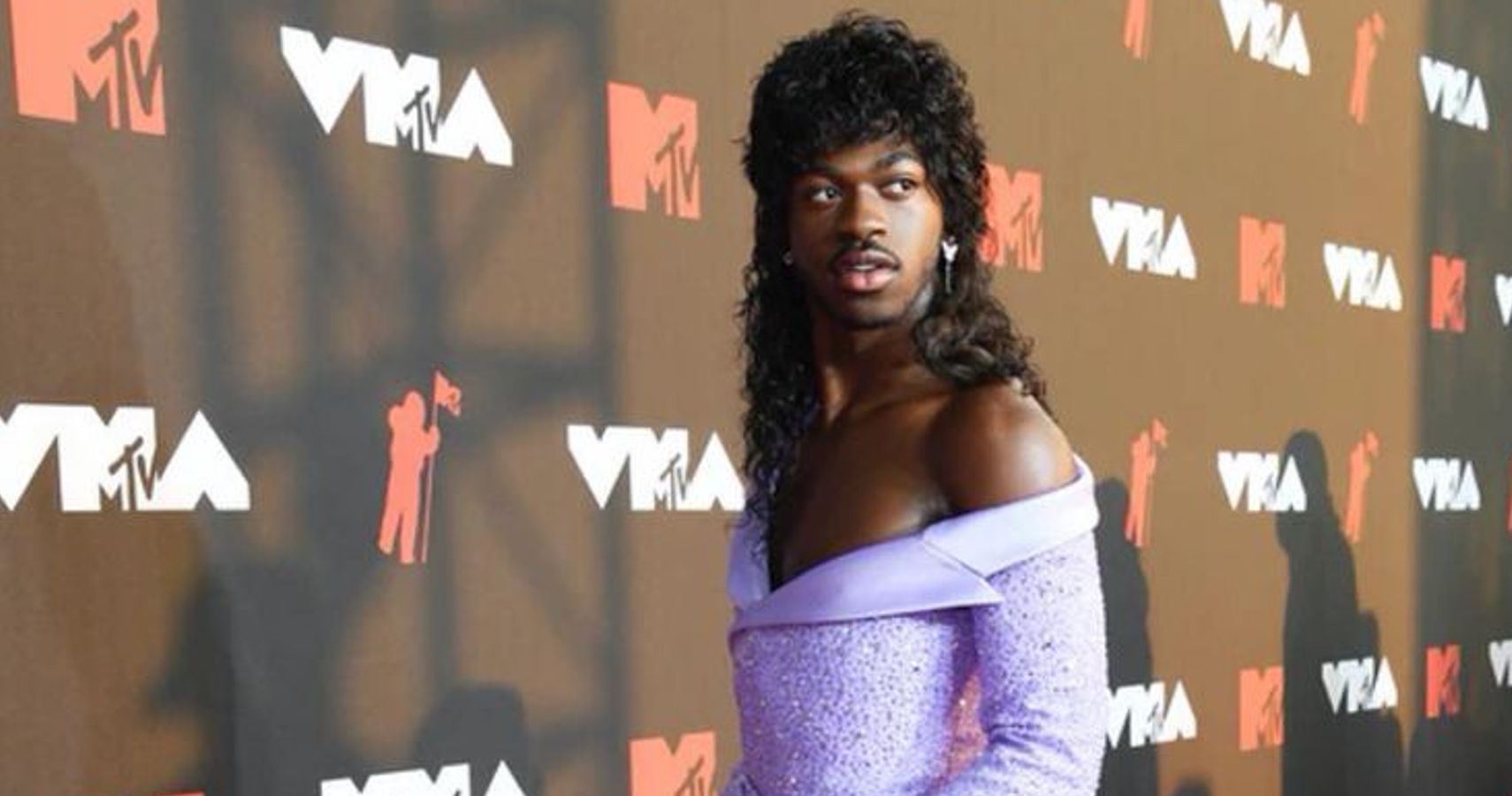 lil nas x purple dress Lil Nas X wows BET Awards 2021 red carpet in elaborate gown